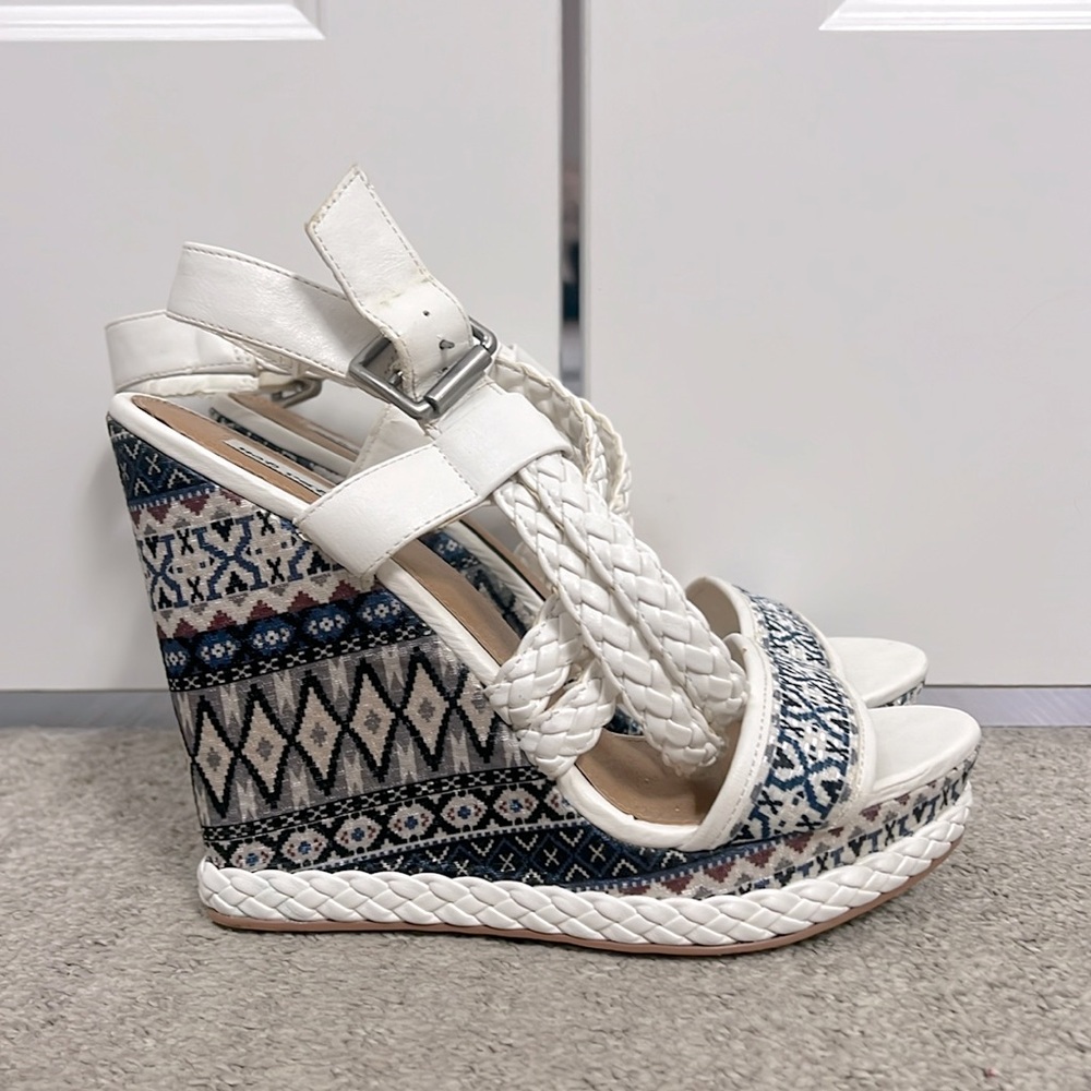 Not rated wedged heels, size 9.5